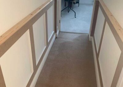 Landing walkway bepoke panelling Archer Carpentry