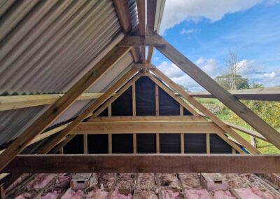 Repaired roof trusses after fire damage