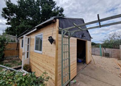 Roof and side panel carpentry on outside building