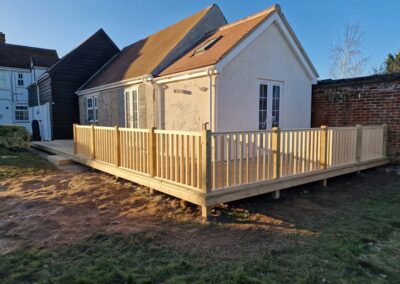 Wooden decking around extension