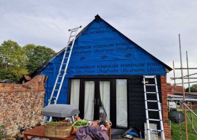 repairs to gable end of fire damaged roof
