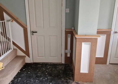 wall panelling around stairs and hallway